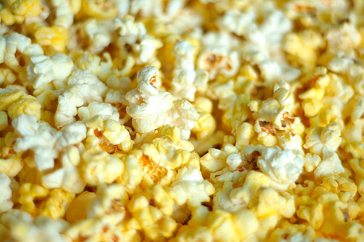 Popcorn made fresh with achiote infused canola oil (for that nice yellow color), dusted with powdered sugar and Lawry's seasoned salt. Yummy